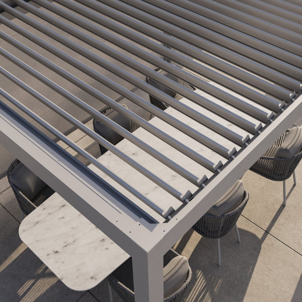Motorised louvre roof partially open above an outdoor living space